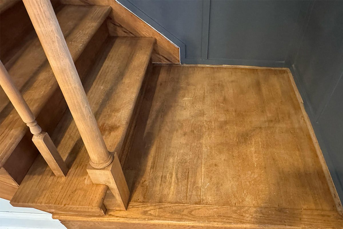 Metal stair railing after laser cleaning NJ — rust removed, bare metal