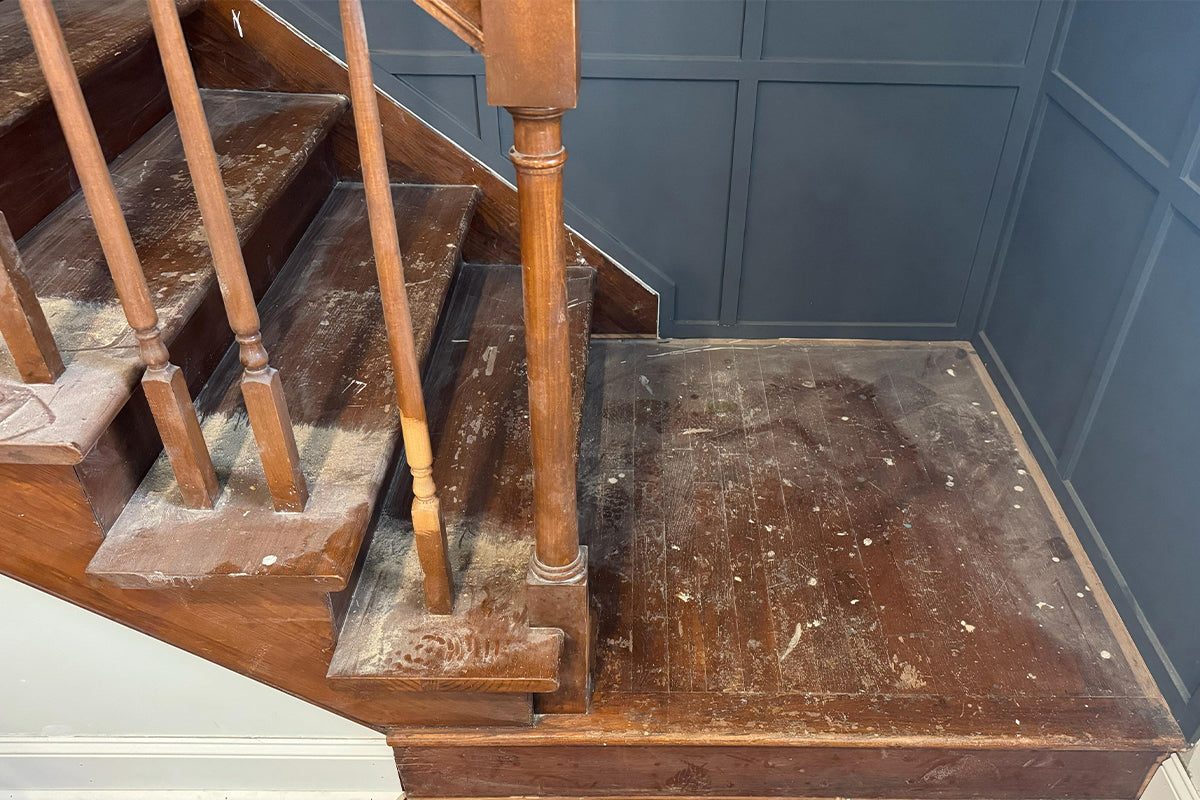 Metal stair railing before laser cleaning NJ — heavy rust and old paint